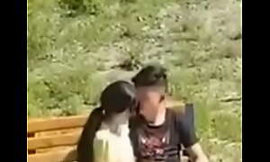 Eastern couple filmed far get under one's public park